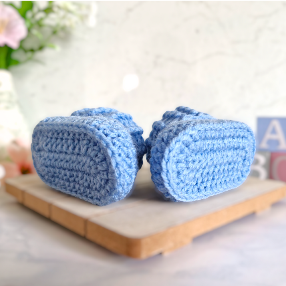 Handmade Baby Booties Crochet With Ridged Cuff – Baby Booties crafted in soft acrylic yarn and available in multiple colours by Twisted by the Sea.