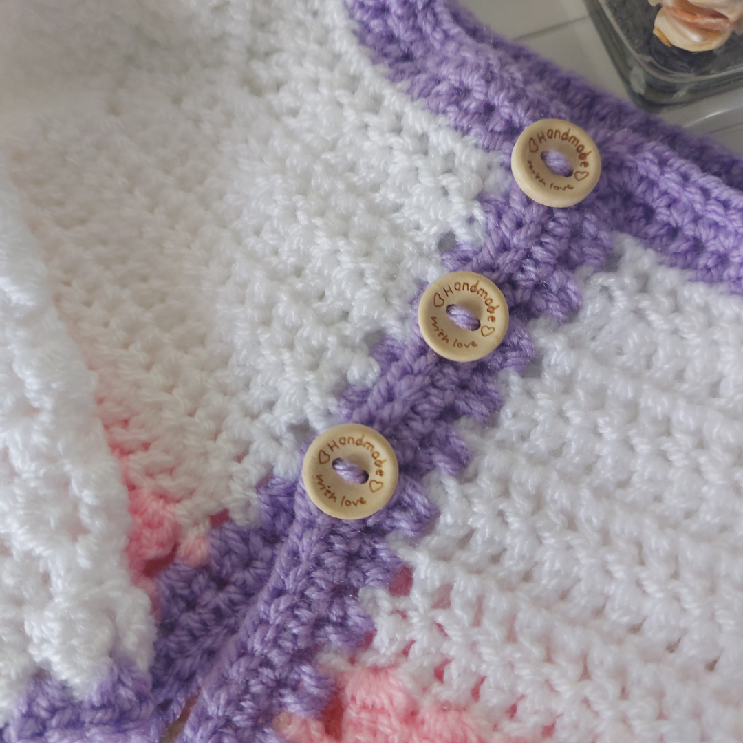 Handmade Handmade Crochet Rainbow Baby Cardigan – Sizes Newborn to 24 Months | Newborn Gift – Baby Toddler Cardigans crafted in soft acrylic yarn and available in multiple colours by Twisted by the Sea.