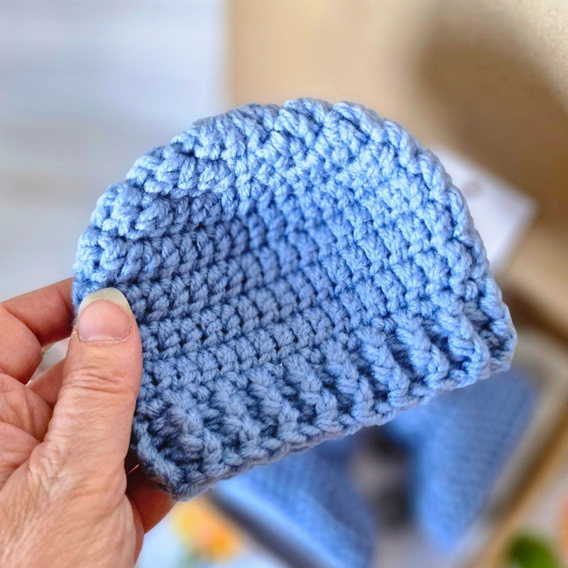 Handmade Handmade Crochet Baby Gift Set – Beanie Hat & Booties with Cute Button Detail (Newborn to 6 Months) – Hat and Bootie Set crafted in soft acrylic yarn and available in multiple colours by Twisted by the Sea.