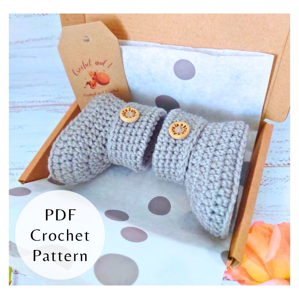 Handmade PDF Crochet Pattern – Baby Booties with Buttons (Instant Download) – PDF pattern crafted in soft acrylic yarn and available in multiple colours by Twisted by the Sea.