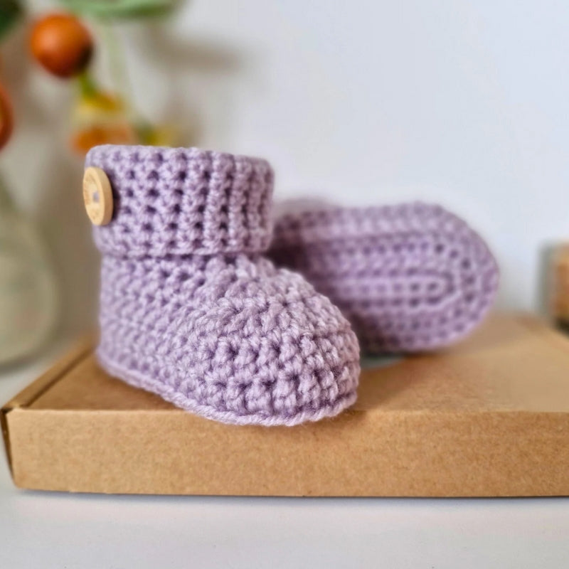 Handmade Crochet Baby Booties – Soft and Cosy Handmade Shoes for Newborns – Baby Booties crafted in soft acrylic yarn and available in multiple colours by Twisted by the Sea.