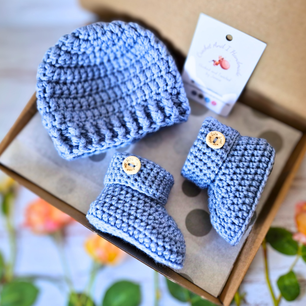 Handmade Handmade Crochet Baby Gift Set – Beanie Hat & Booties with Cute Button Detail (Newborn to 6 Months) – Hat and Bootie Set crafted in soft acrylic yarn and available in multiple colours by Twisted by the Sea.