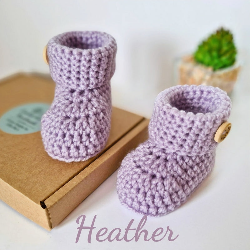 Handmade Crochet Baby Booties – Soft and Cosy Handmade Shoes for Newborns – Baby Booties crafted in soft acrylic yarn and available in multiple colours by Twisted by the Sea.