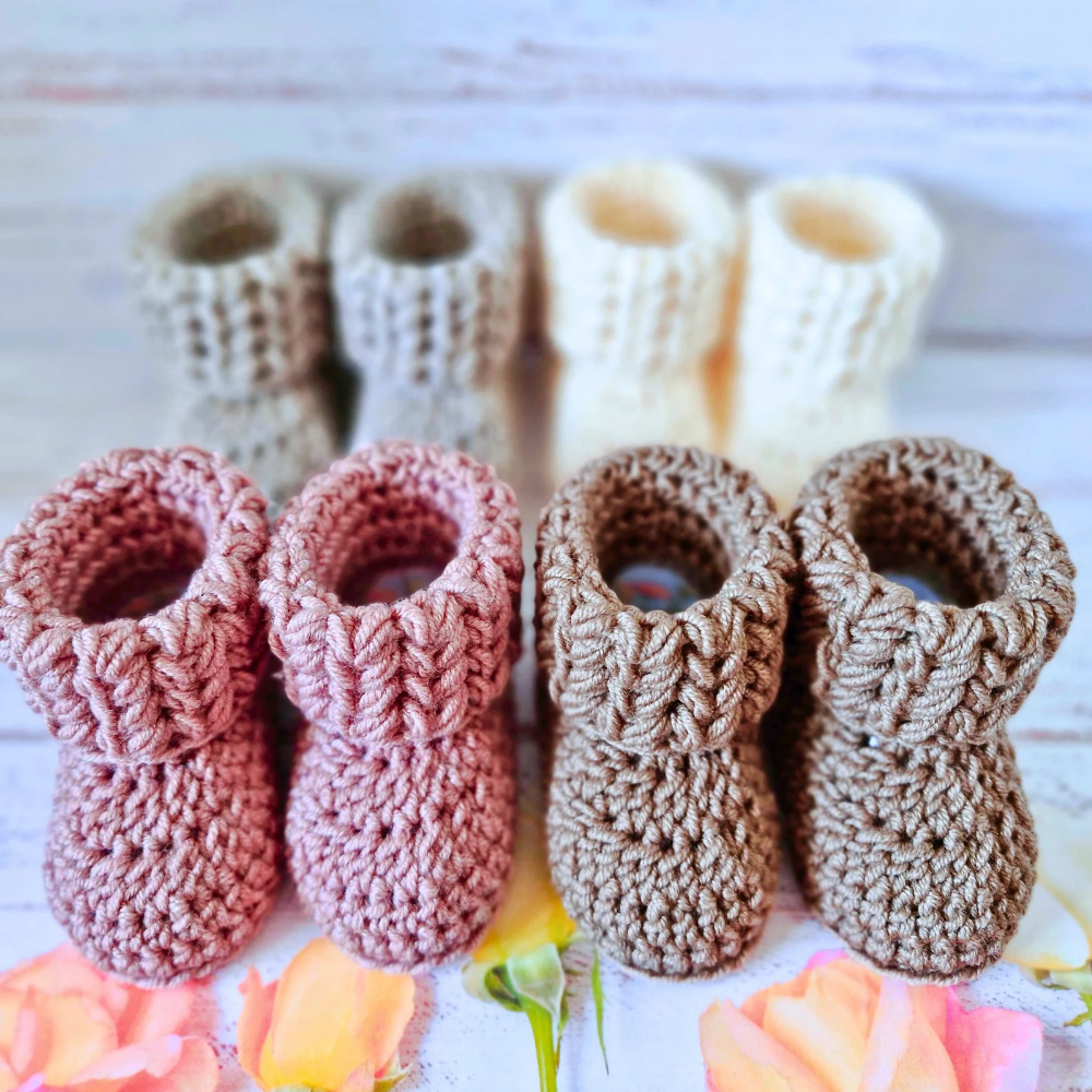 Handmade Handmade Crochet Baby Booties – Newborn to 6 Months | Baby Shower Gift – Baby Booties crafted in soft acrylic yarn and available in multiple colours by Twisted by the Sea.