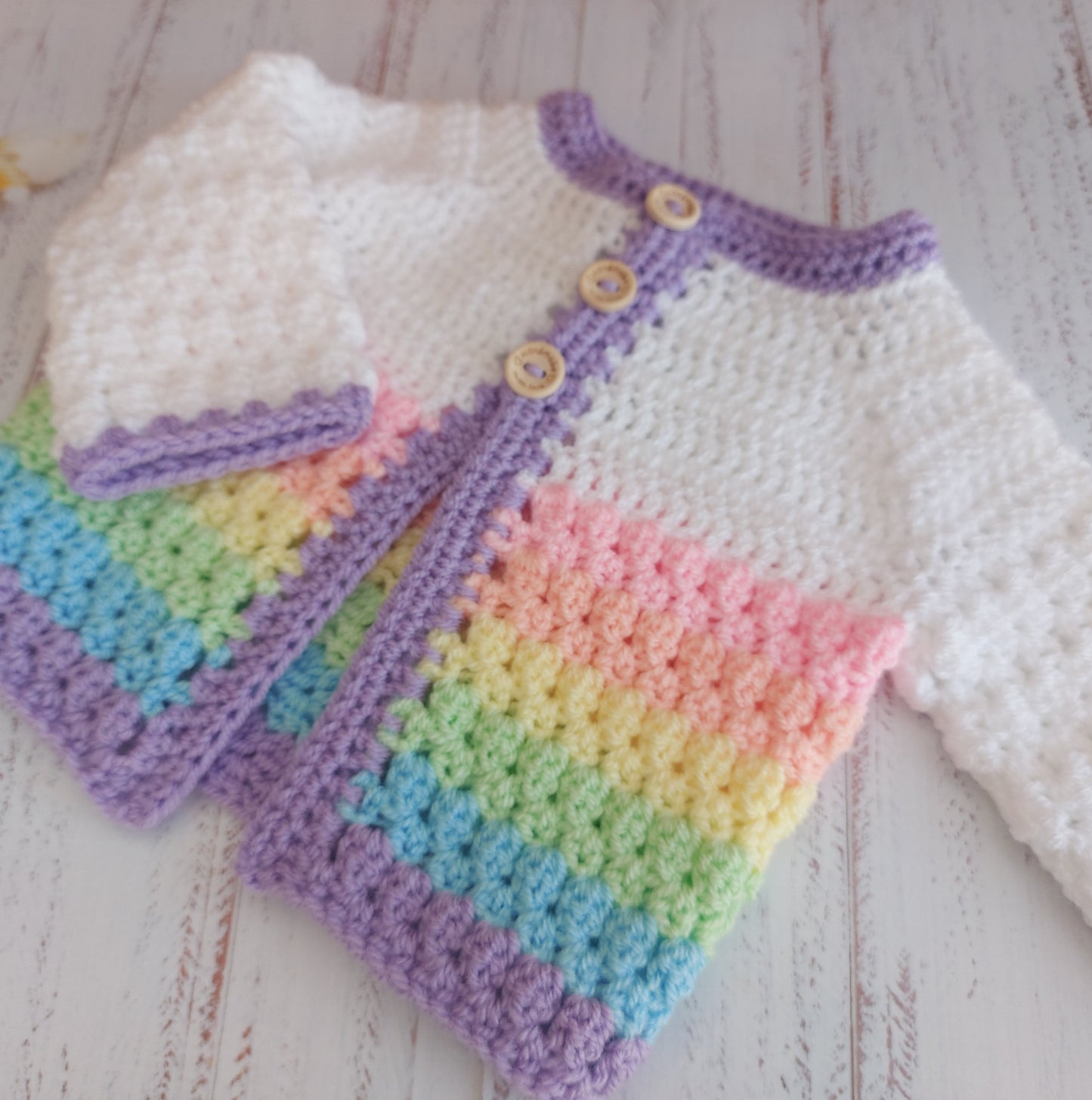 Handmade Handmade Crochet Rainbow Baby Cardigan – Sizes Newborn to 24 Months | Newborn Gift – Baby Toddler Cardigans crafted in soft acrylic yarn and available in multiple colours by Twisted by the Sea.