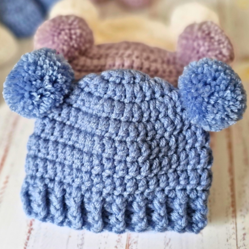 Handmade Handmade Crochet Double Pom Pom Baby Hat – Newborn to 12 Months – Beanie Hat crafted in soft acrylic yarn and available in multiple colours by Twisted by the Sea.