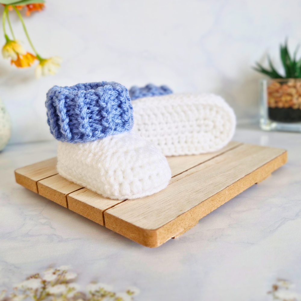Handmade Crochet Cuffed Baby Booties – Newborn to 6 Months – Baby Booties crafted in soft acrylic yarn and available in multiple colours by Twisted by the Sea.