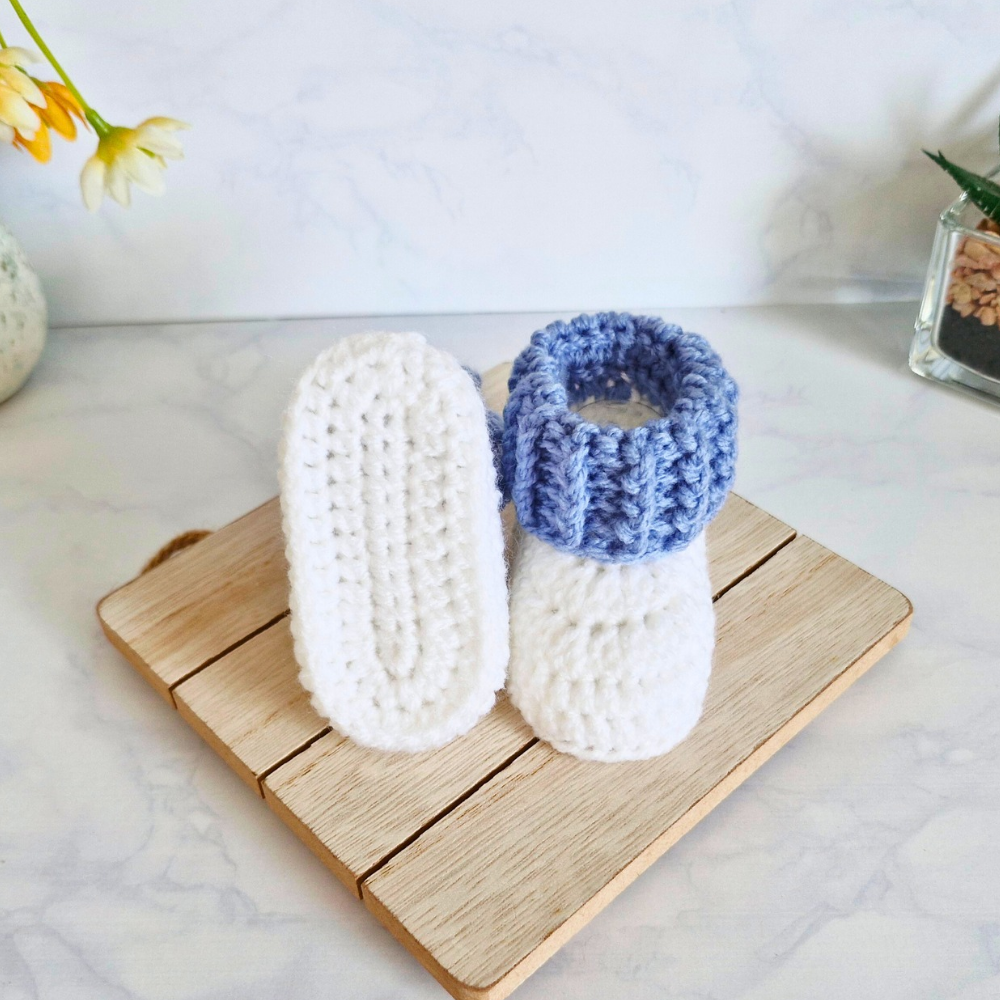 Handmade Crochet Cuffed Baby Booties – Newborn to 6 Months – Baby Booties crafted in soft acrylic yarn and available in multiple colours by Twisted by the Sea.