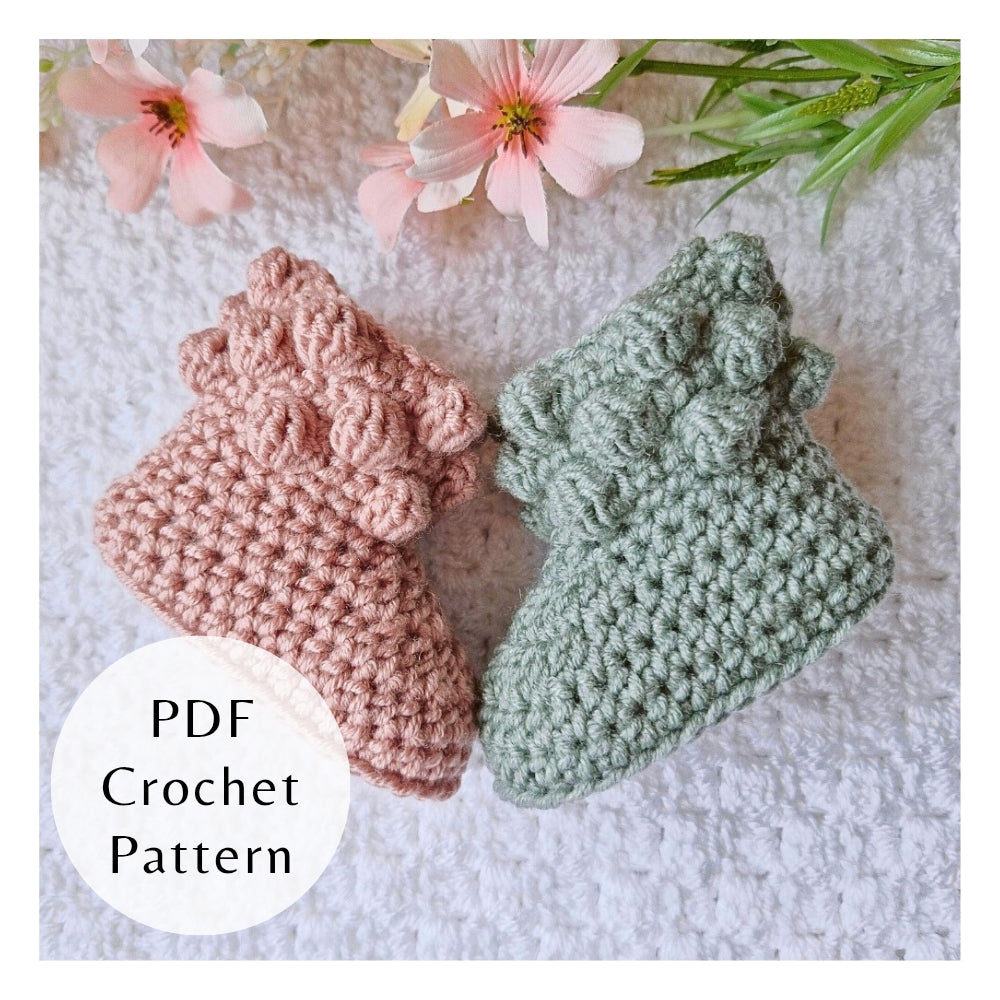 Handmade crochet pattern for baby booties by Twisted by the Sea. Digital PDF download featuring US crochet terms and step-by-step photos.