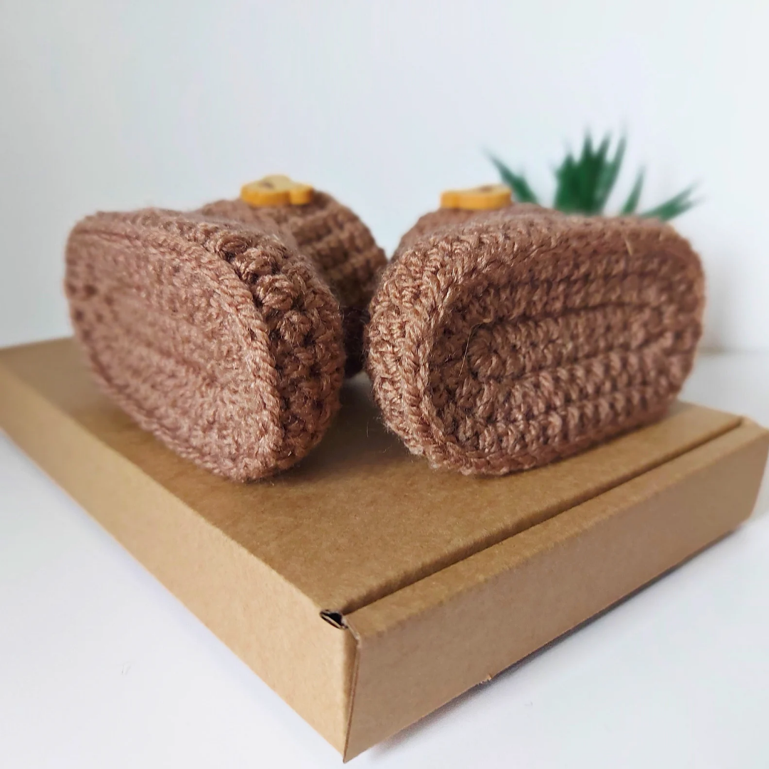 Handmade Handmade Crochet Baby Booties with Teddy Button - Sizes Newborn, 0-3 and 3-6 Months – Baby Booties crafted in soft acrylic yarn and available in multiple colours by Twisted by the Sea.