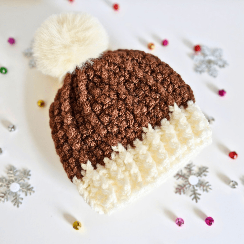 A newborn baby handmade crochet Christmas Pudding Hat. - Twisted by the Sea