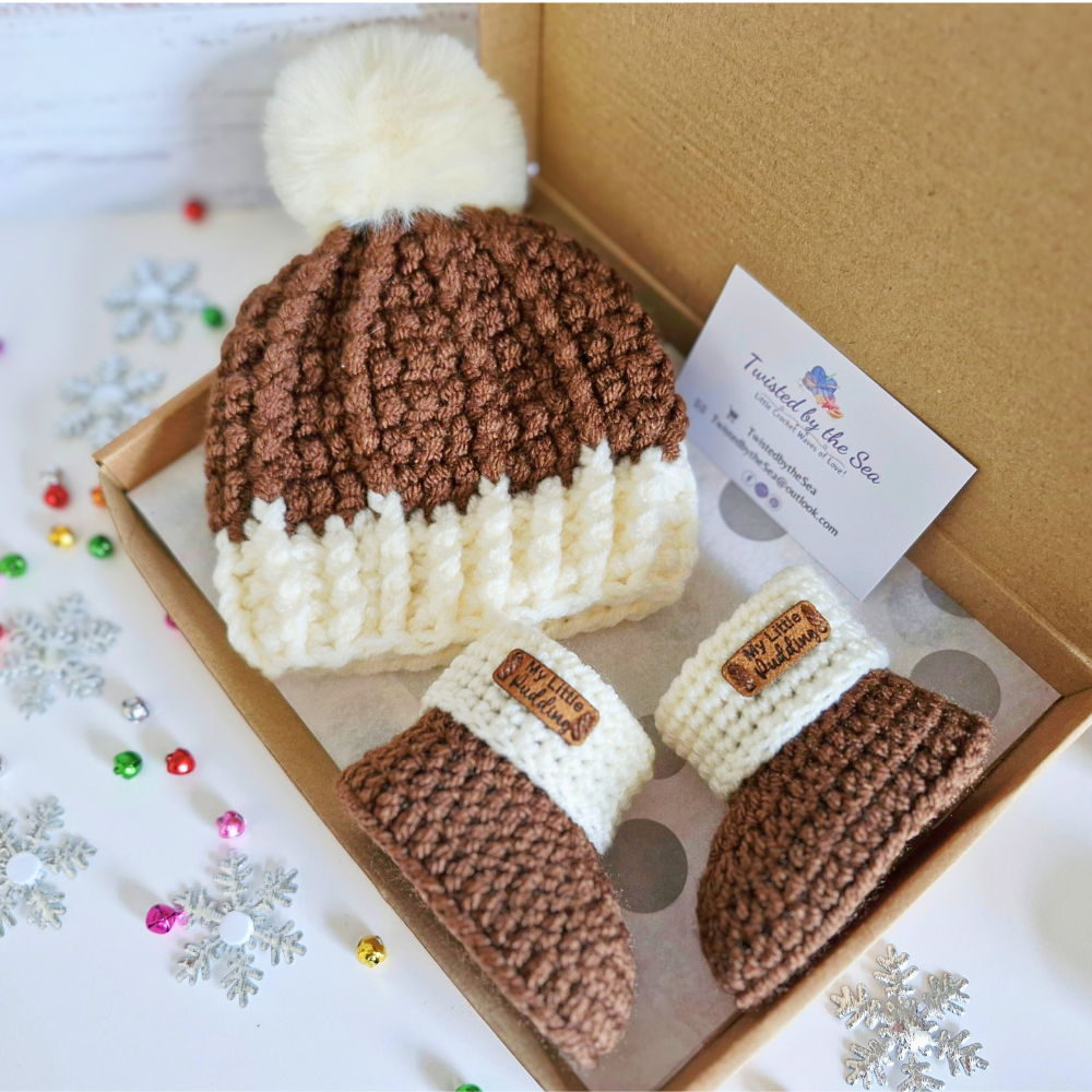 Handmade Crochet Christmas Baby Gift Set – Pudding Hat & Booties for Newborn to 6 Months – Hat and Bootie Set crafted in soft acrylic yarn and available in multiple colours by Twisted by the Sea.