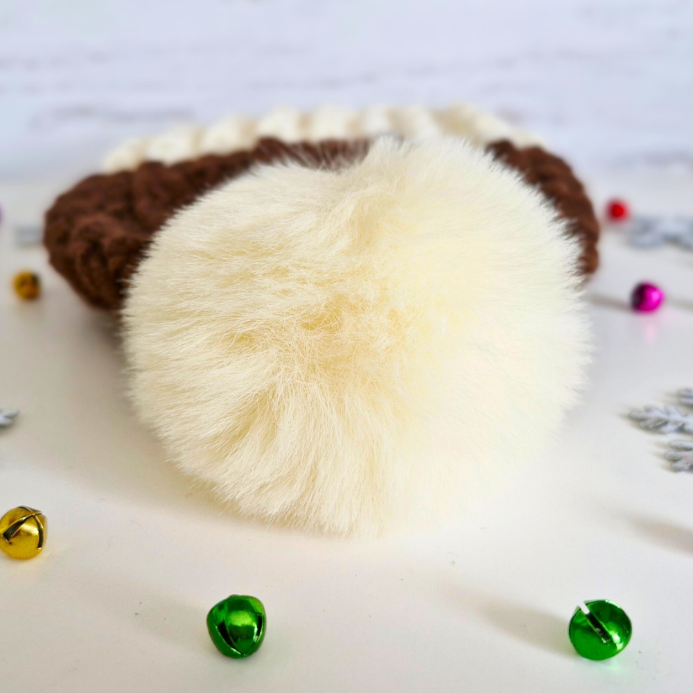 Handmade Crochet Christmas Baby Gift Set – Pudding Hat & Booties for Newborn to 6 Months – Hat and Bootie Set crafted in soft acrylic yarn and available in multiple colours by Twisted by the Sea.