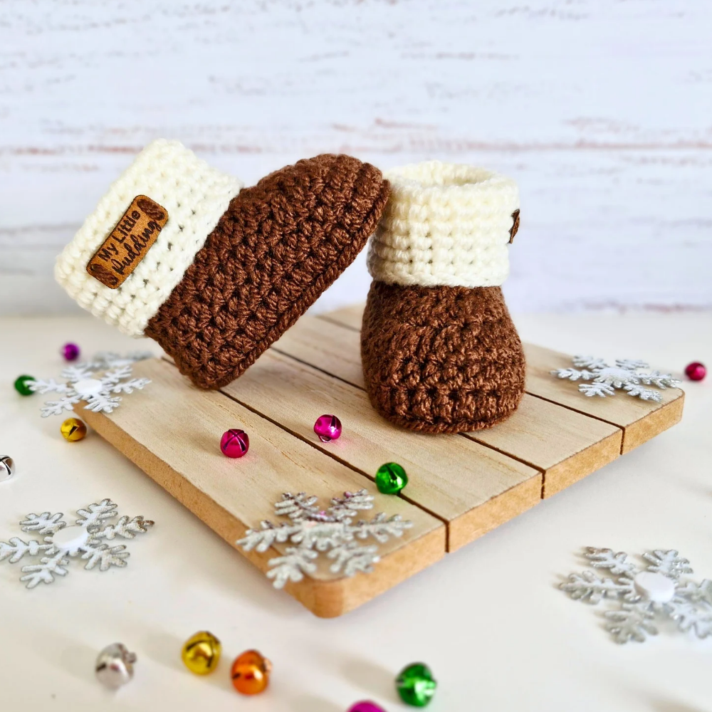 Handmade Crochet Christmas Baby Gift Set – Pudding Hat & Booties for Newborn to 6 Months – Hat and Bootie Set crafted in soft acrylic yarn and available in multiple colours by Twisted by the Sea.
