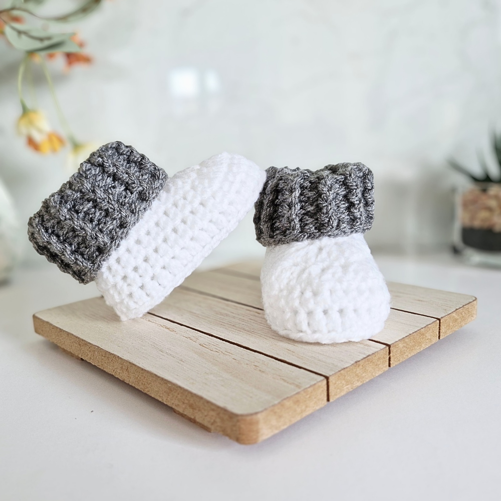 Handmade Handmade White Crochet Baby Booties with Coloured Cuff – Newborn Gift Idea – Baby Booties crafted in soft acrylic yarn and available in multiple colours by Twisted by the Sea.