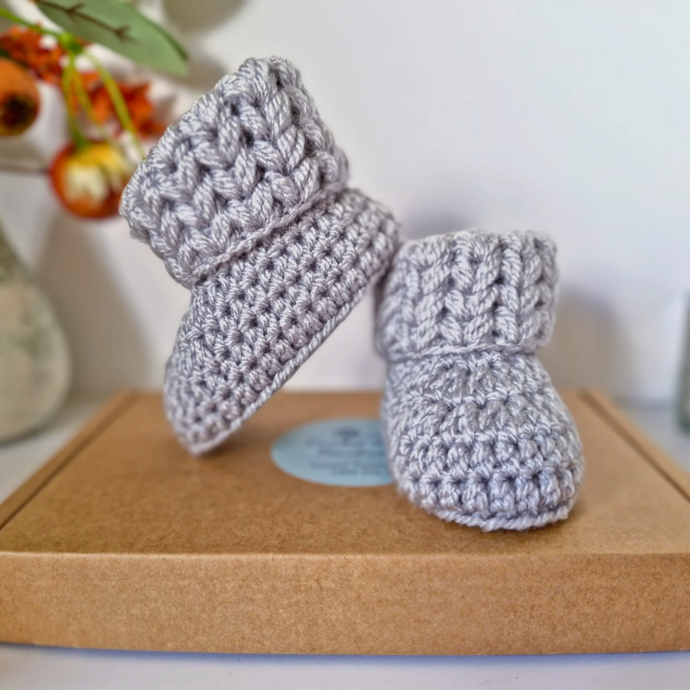 Handmade Handmade Crochet Baby Booties – Newborn to 6 Months | Baby Shower Gift – Baby Booties crafted in soft acrylic yarn and available in multiple colours by Twisted by the Sea.
