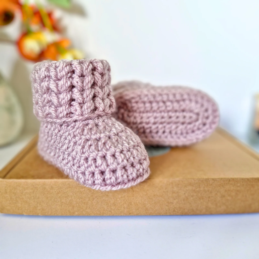 Handmade Handmade Crochet Baby Booties – Newborn to 6 Months | Baby Shower Gift – Baby Booties crafted in soft acrylic yarn and available in multiple colours by Twisted by the Sea.