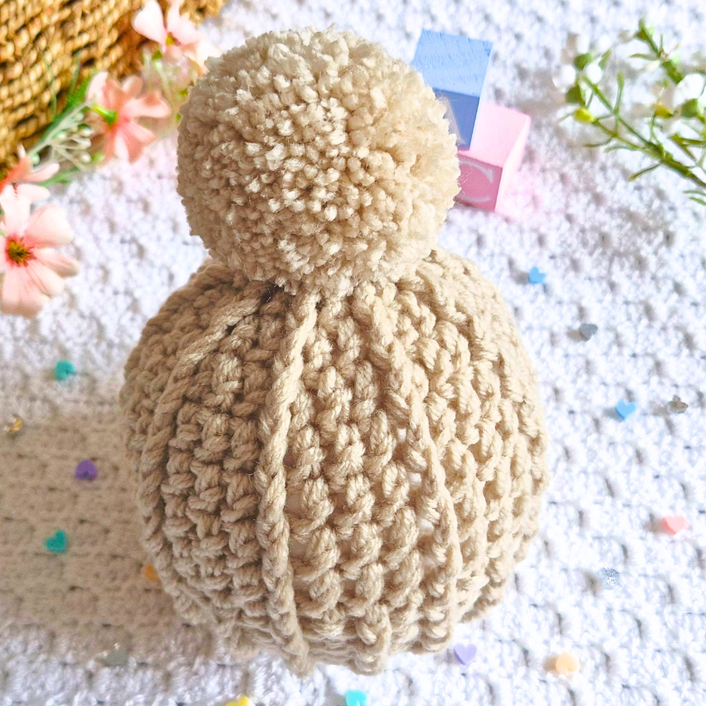 Handmade Handmade Crochet Pom Pom Baby Hat – Newborn to 12 Months – Beanie Hat crafted in soft acrylic yarn and available in multiple colours by Twisted by the Sea.