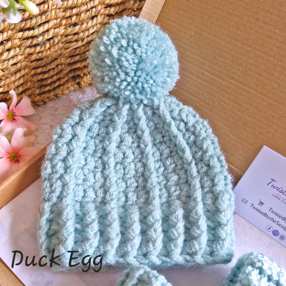Handmade Newborn Baby Gift Set – Handmade Crochet Hat with Matching Booties – crafted in soft acrylic yarn and available in multiple colours by Twisted by the Sea.