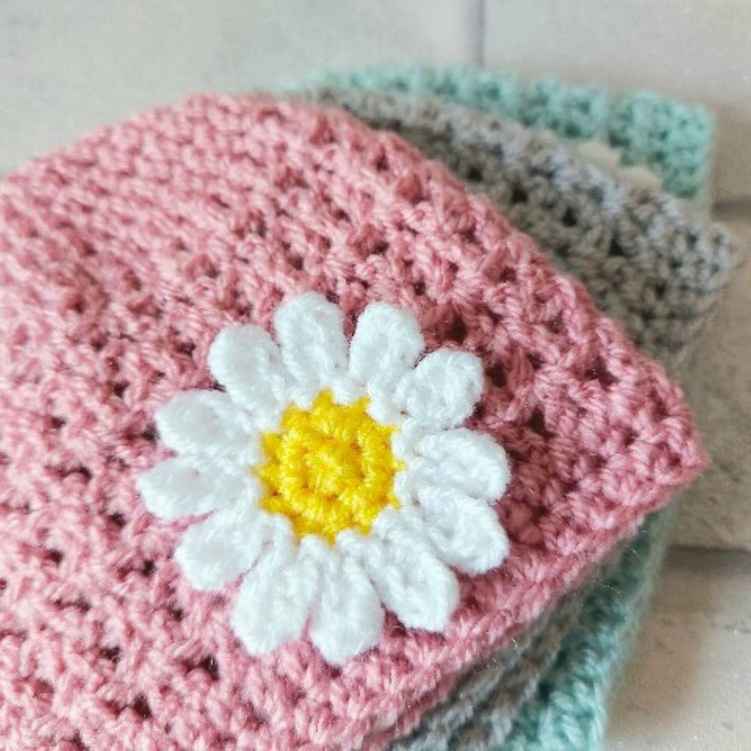 Handmade Handmade Baby Beanie Hat, Crochet Newborn Daisy Hat, Sizes Newborn to 12 Months – Beanie Hat crafted in soft acrylic yarn and available in multiple colours by Twisted by the Sea.