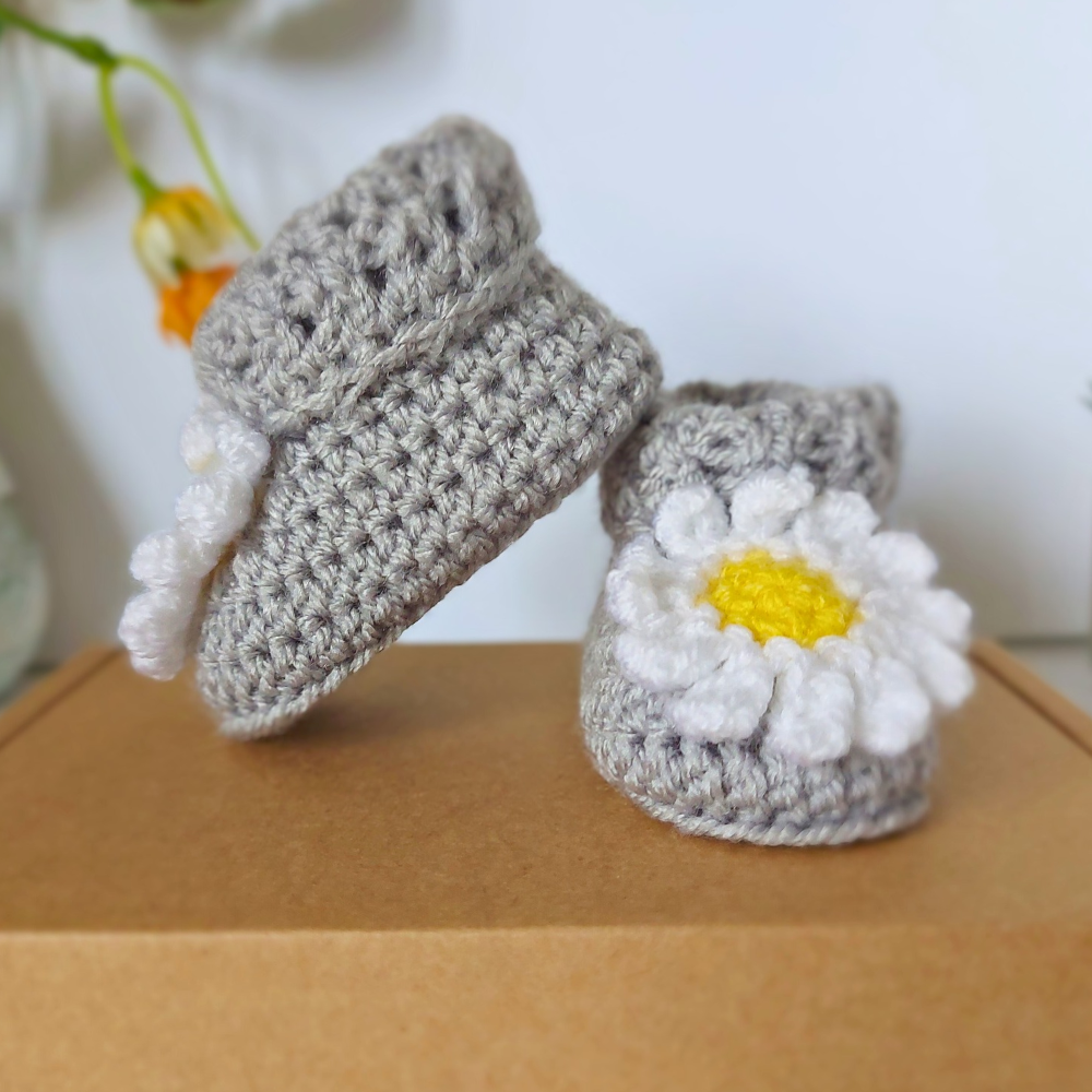 Handmade Handmade Daisy Crochet Baby Booties – Baby Booties crafted in soft acrylic yarn and available in multiple colours by Twisted by the Sea.