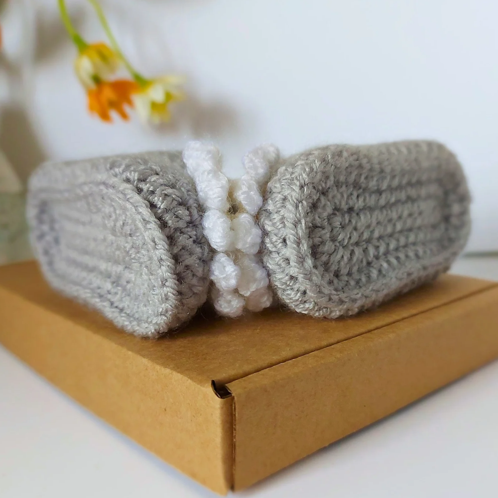 Handmade Handmade Daisy Crochet Baby Booties – Baby Booties crafted in soft acrylic yarn and available in multiple colours by Twisted by the Sea.