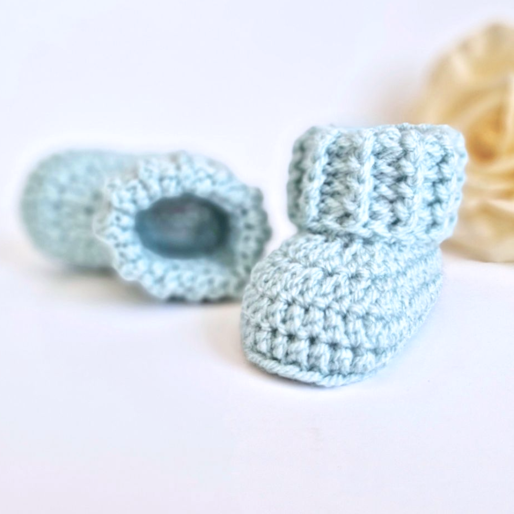 Handmade Baby Booties Crochet With Ridged Cuff – Baby Booties crafted in soft acrylic yarn and available in multiple colours by Twisted by the Sea.