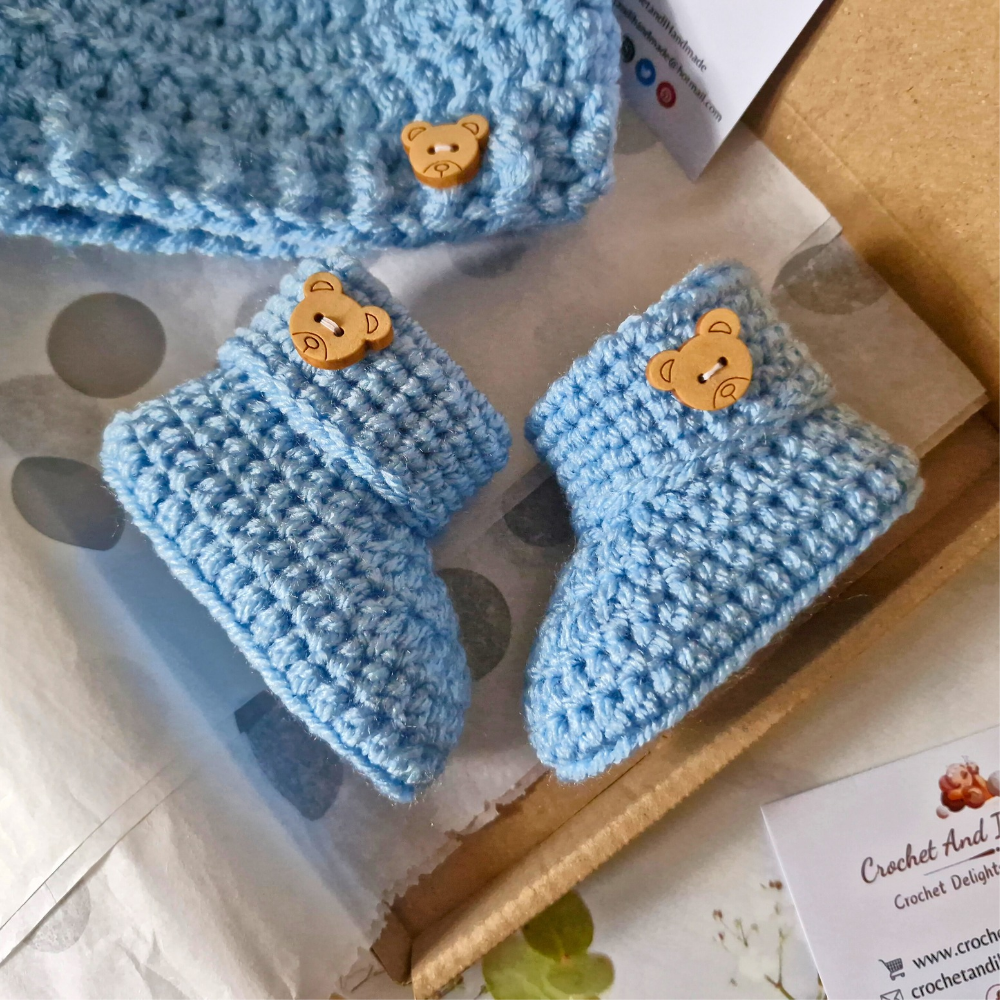 Handmade Handmade Crochet Baby Booties with Teddy Button - Sizes Newborn, 0-3 and 3-6 Months – Baby Booties crafted in soft acrylic yarn and available in multiple colours by Twisted by the Sea.