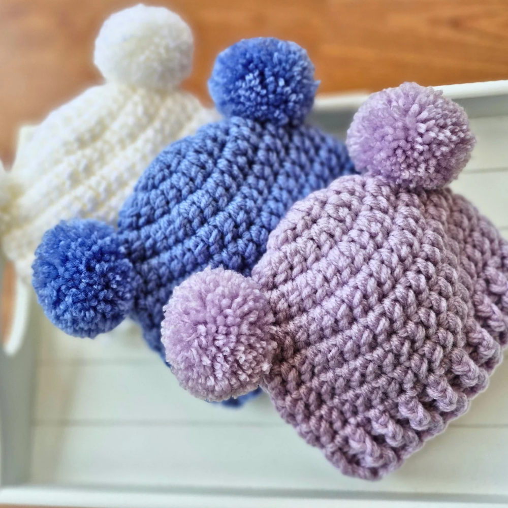 Handmade Handmade Crochet Double Pom Pom Baby Hat – Newborn to 12 Months – Beanie Hat crafted in soft acrylic yarn and available in multiple colours by Twisted by the Sea.