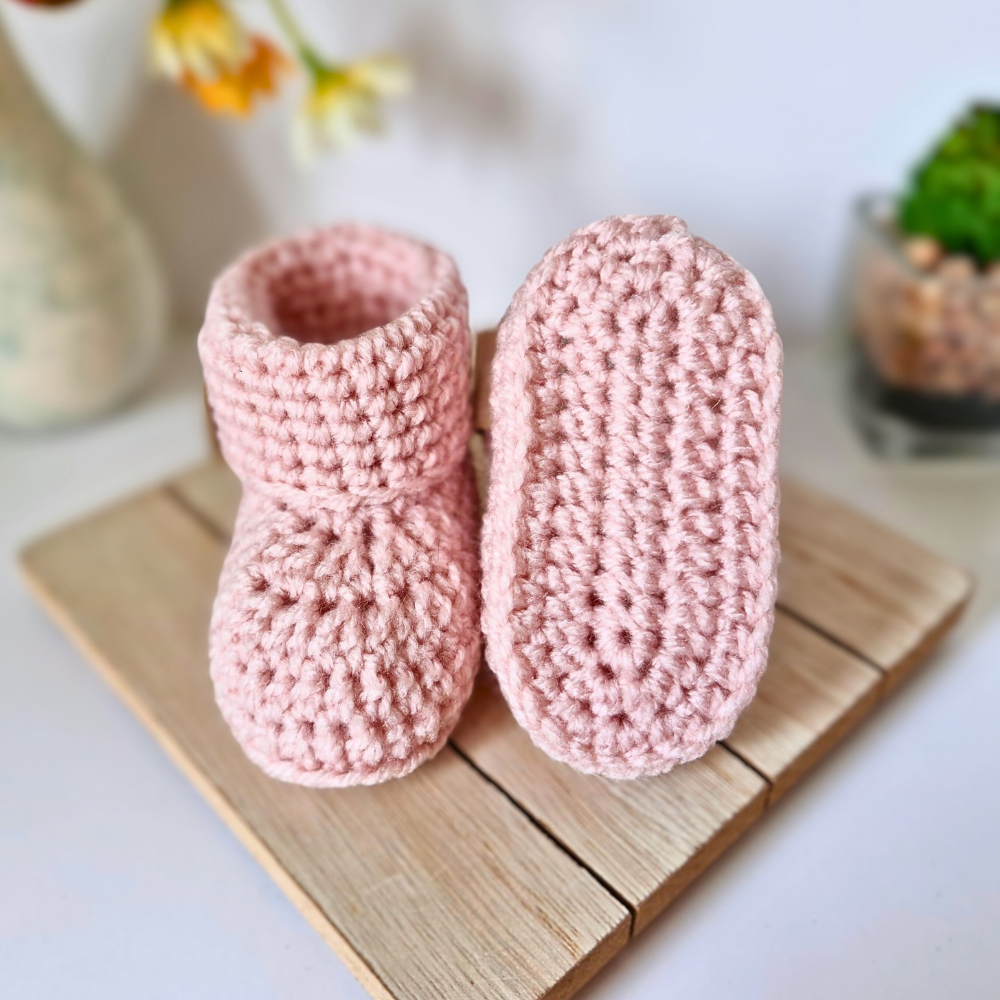 Handmade Hello World Crochet Baby Hat and Booties Set - Handmade Pom-Pom Newborn Gift (0-6 Months) – crafted in soft acrylic yarn and available in multiple colours by Twisted by the Sea.