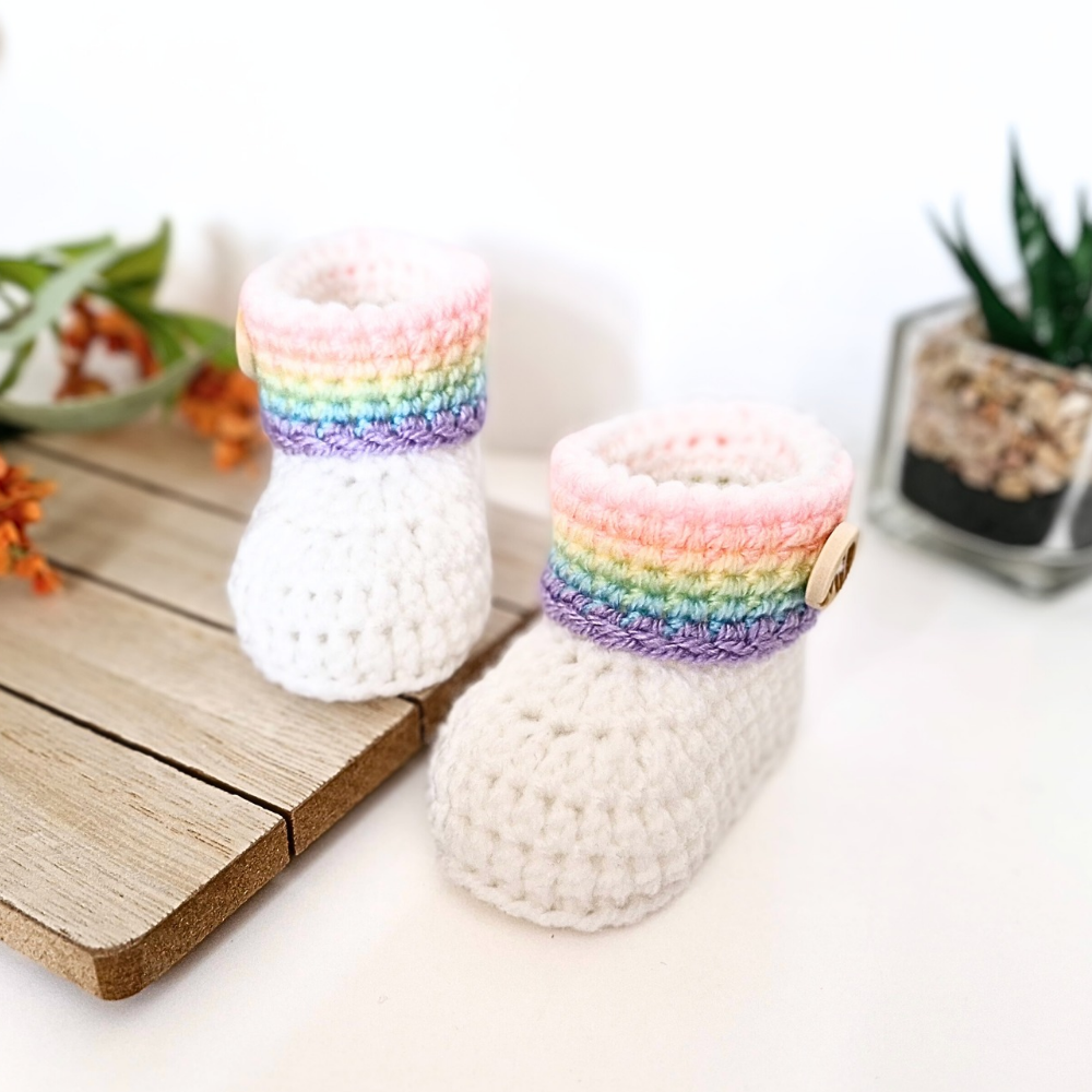 Handmade Rainbow Baby Crochet Booties, Gender Neutral Keepsake Gift – Baby Booties crafted in soft acrylic yarn and available in multiple colours by Twisted by the Sea.