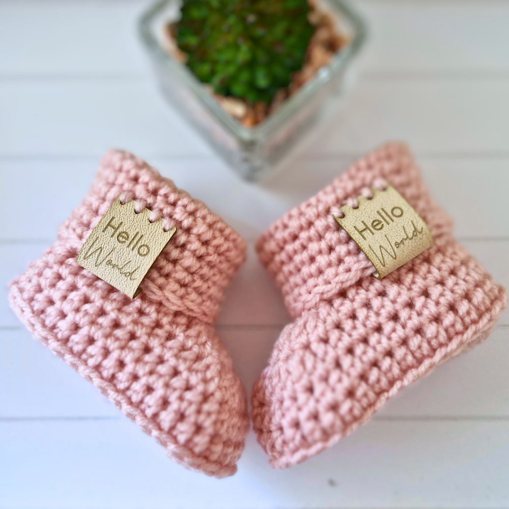 Handmade Hello World Crochet Baby Hat and Booties Set - Handmade Pom-Pom Newborn Gift (0-6 Months) – crafted in soft acrylic yarn and available in multiple colours by Twisted by the Sea.