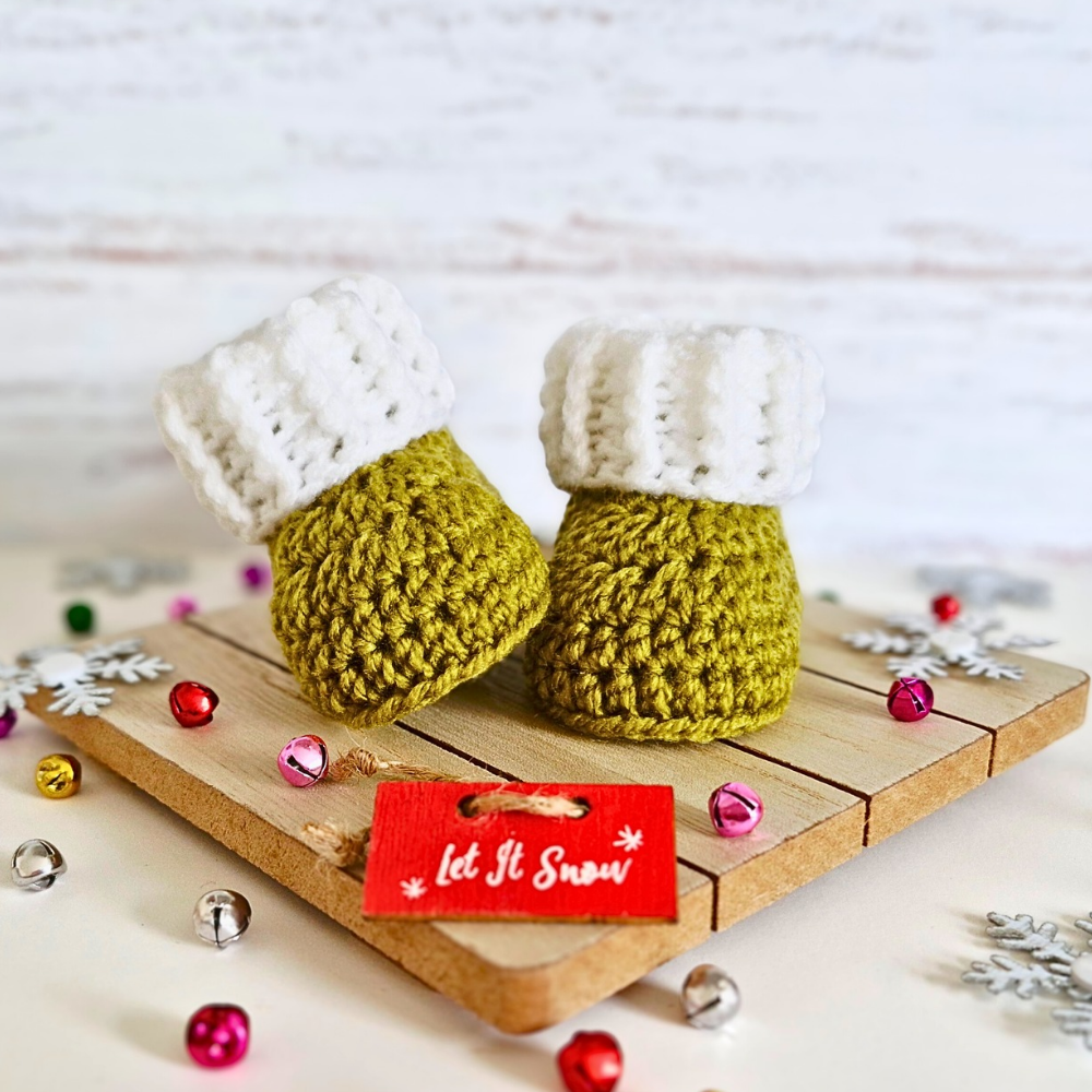 Handmade Handmade Christmas Baby Hat & Bootie Set – Mistletoe Green and White – Hat and Bootie Set crafted in soft acrylic yarn and available in multiple colours by Twisted by the Sea.