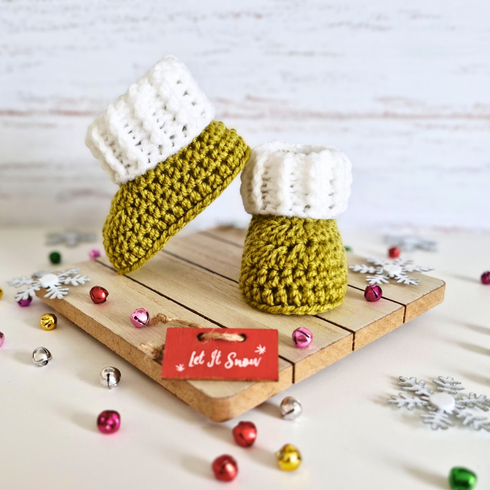 Handmade Handmade Christmas Baby Hat & Bootie Set – Mistletoe Green and White – Hat and Bootie Set crafted in soft acrylic yarn and available in multiple colours by Twisted by the Sea.