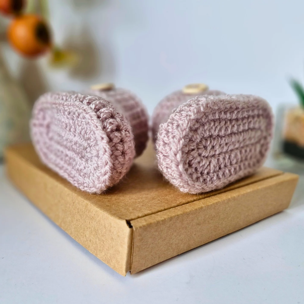Handmade Born in 2025 Crochet Baby Booties – Handmade Keepsake Gift for Newborns – Baby Booties crafted in soft acrylic yarn and available in multiple colours by Twisted by the Sea.