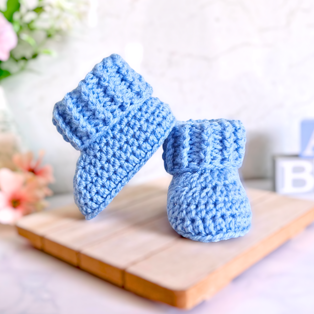 Handmade Baby Booties Crochet With Ridged Cuff – Baby Booties crafted in soft acrylic yarn and available in multiple colours by Twisted by the Sea.