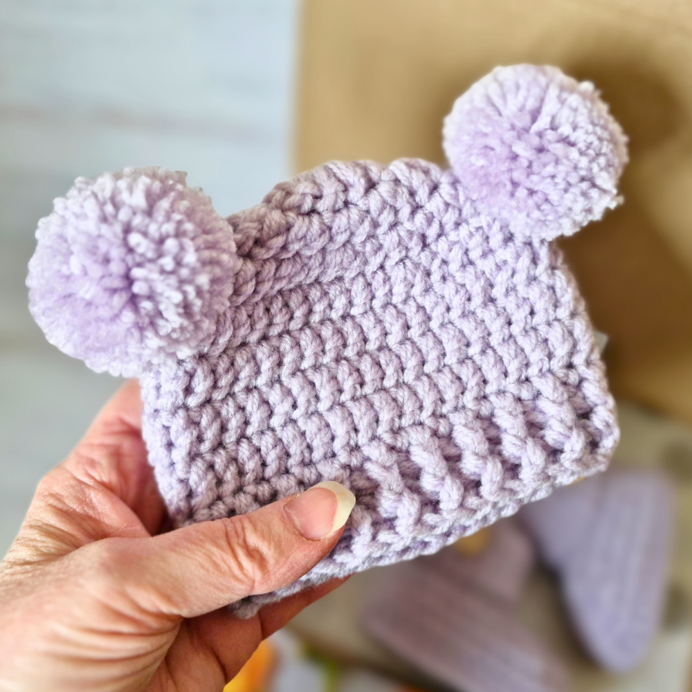 Handmade Handmade Crochet Double Pom Pom Baby Hat – Newborn to 12 Months – Beanie Hat crafted in soft acrylic yarn and available in multiple colours by Twisted by the Sea.