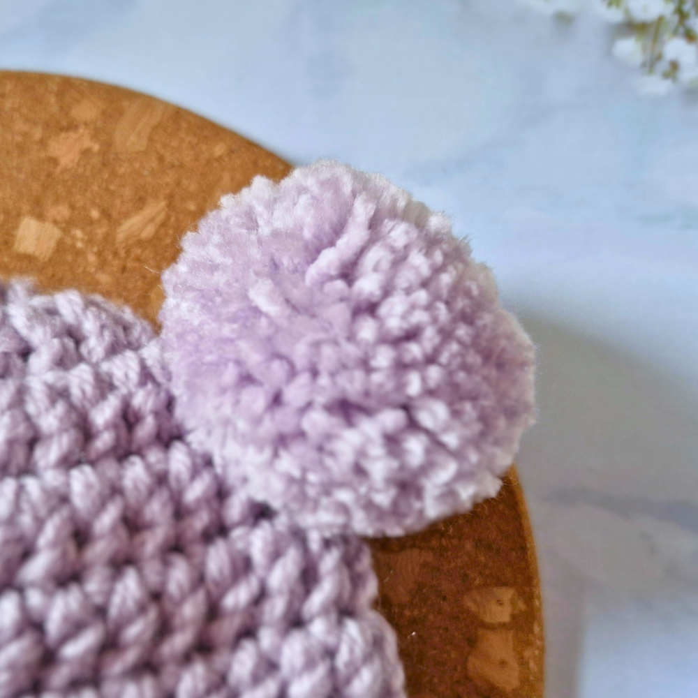 Handmade Handmade Crochet Double Pom Pom Baby Hat – Newborn to 12 Months – Beanie Hat crafted in soft acrylic yarn and available in multiple colours by Twisted by the Sea.