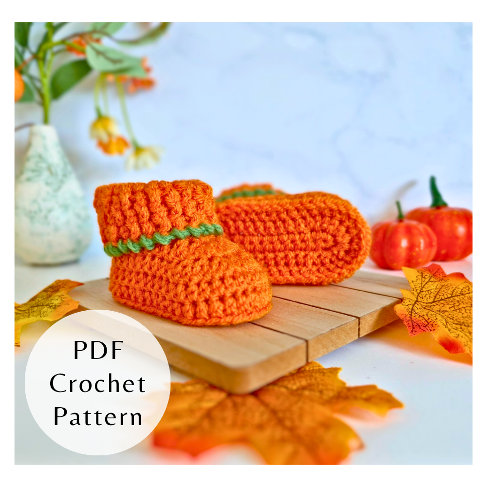 Handmade Pumpkin Baby Booties Crochet Pattern – PDF Download in 3 Sizes (Newborn to 6 Months) – PDF pattern crafted in soft acrylic yarn and available in multiple colours by Twisted by the Sea.