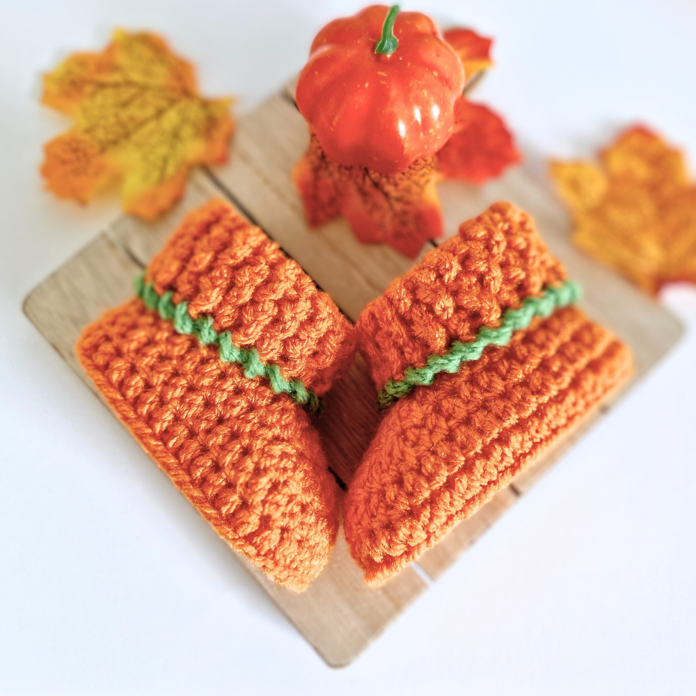 Handmade Handmade Pumpkin Crochet Baby Booties – Baby Booties crafted in soft acrylic yarn and available in multiple colours by Twisted by the Sea.