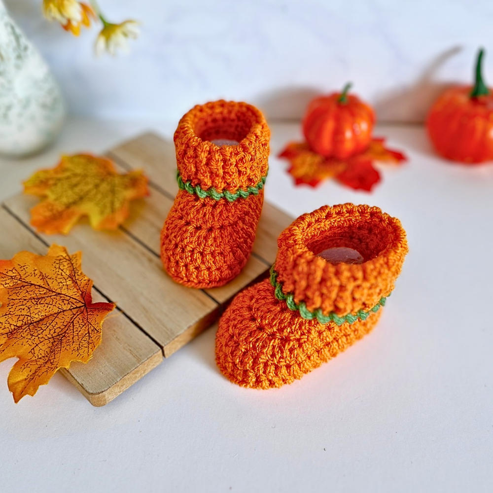 Handmade Handmade Pumpkin Crochet Baby Booties – Baby Booties crafted in soft acrylic yarn and available in multiple colours by Twisted by the Sea.