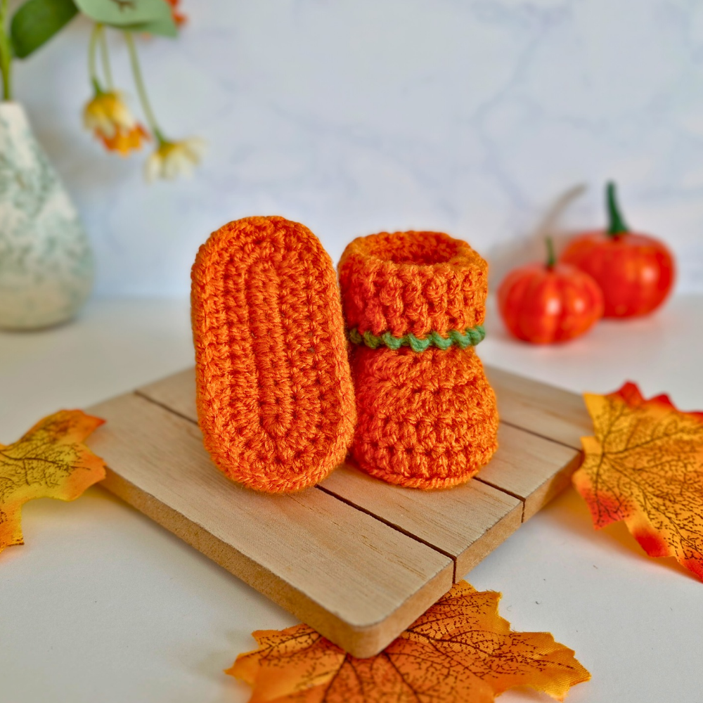 Handmade Handmade Crochet Pumpkin Baby Hat & Booties Set – Autumn Gift – Hat and Bootie Set crafted in soft acrylic yarn and available in multiple colours by Twisted by the Sea.