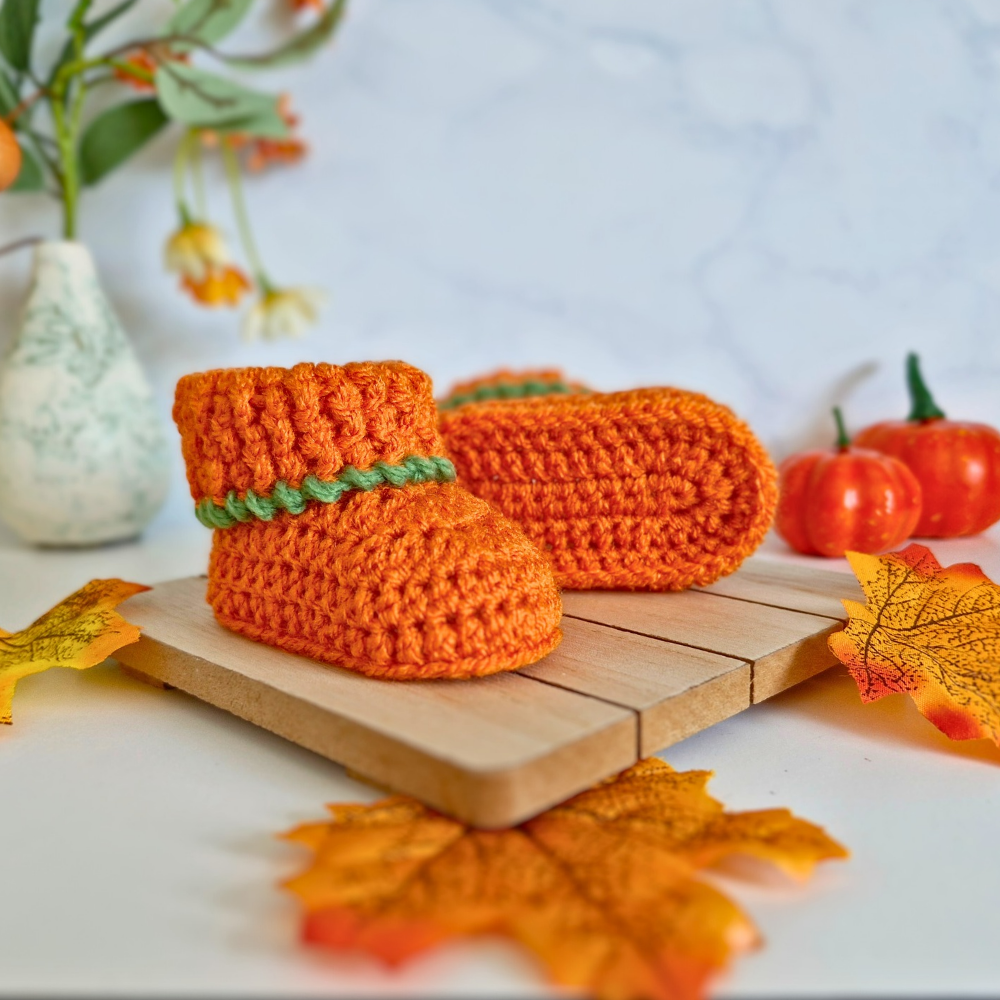 Handmade Handmade Pumpkin Crochet Baby Booties – Baby Booties crafted in soft acrylic yarn and available in multiple colours by Twisted by the Sea.