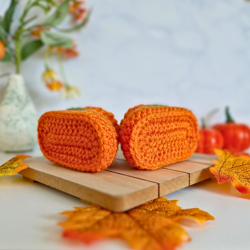 Handmade Handmade Pumpkin Crochet Baby Booties – Baby Booties crafted in soft acrylic yarn and available in multiple colours by Twisted by the Sea.