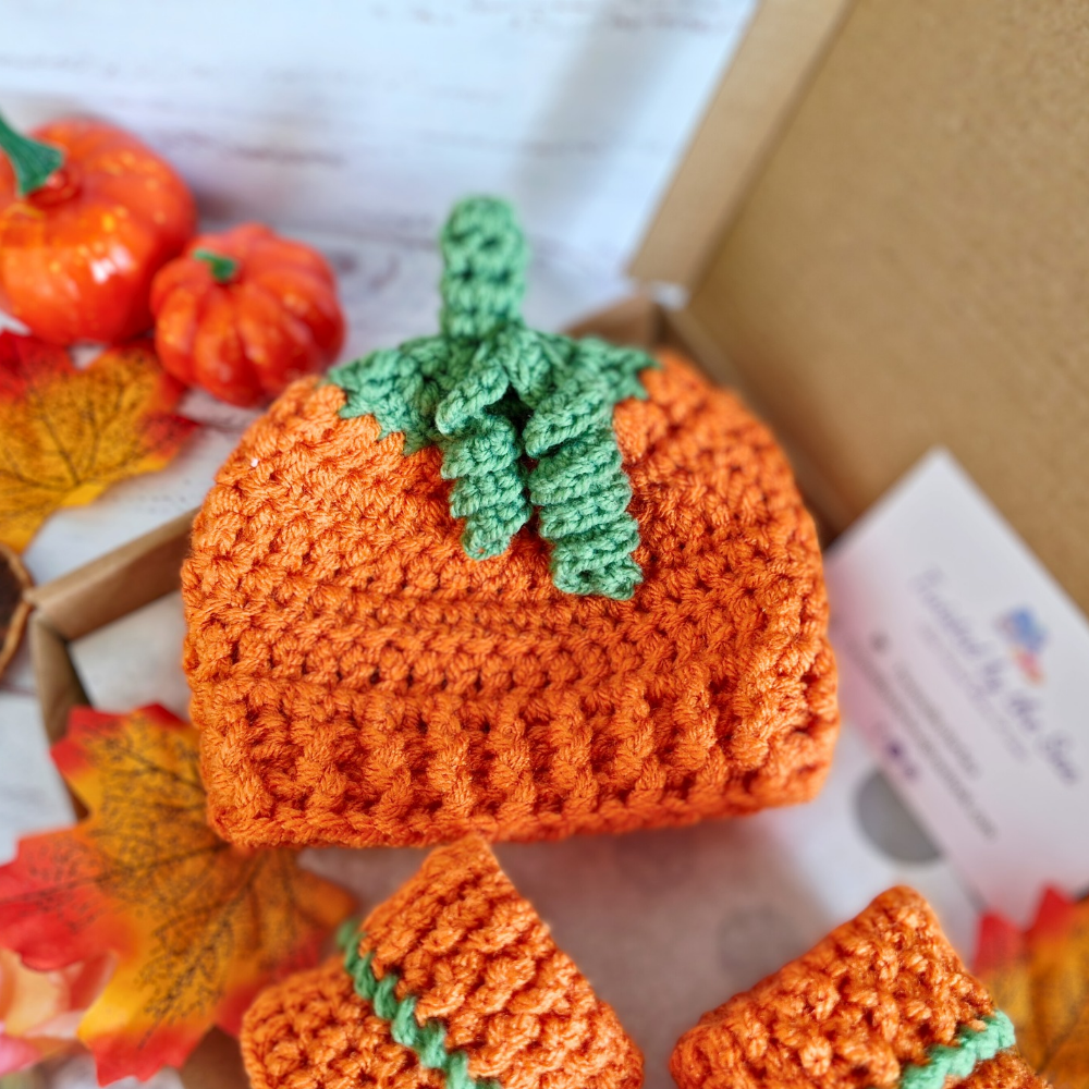 Handmade Handmade Crochet Pumpkin Baby Hat – Autumn Baby Gift – Beanie Hat crafted in soft acrylic yarn and available in multiple colours by Twisted by the Sea.