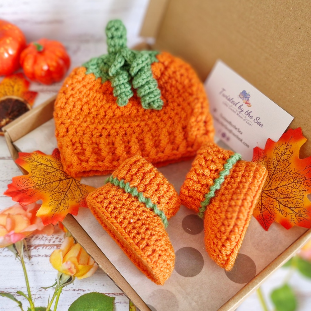 Handmade Handmade Crochet Pumpkin Baby Hat – Autumn Baby Gift – Beanie Hat crafted in soft acrylic yarn and available in multiple colours by Twisted by the Sea.