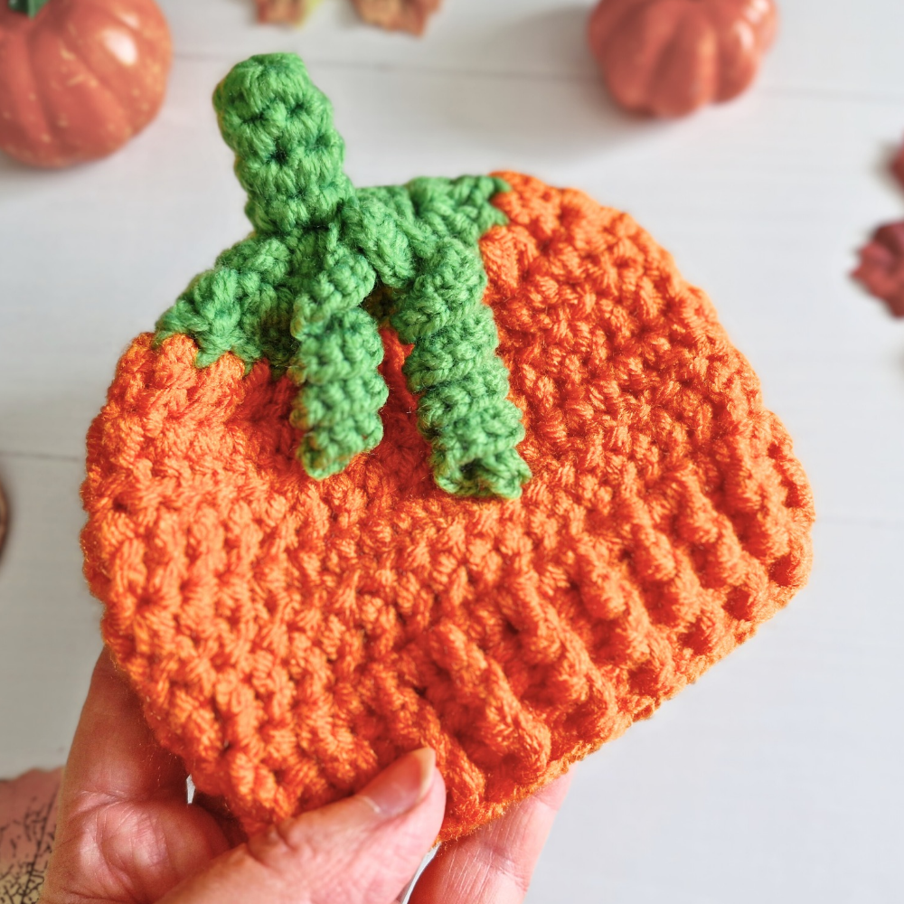 Handmade Handmade Crochet Pumpkin Baby Hat – Autumn Baby Gift – Beanie Hat crafted in soft acrylic yarn and available in multiple colours by Twisted by the Sea.