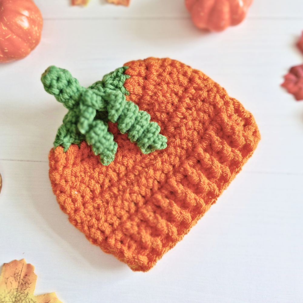 Handmade Handmade Crochet Pumpkin Baby Hat – Autumn Baby Gift – Beanie Hat crafted in soft acrylic yarn and available in multiple colours by Twisted by the Sea.