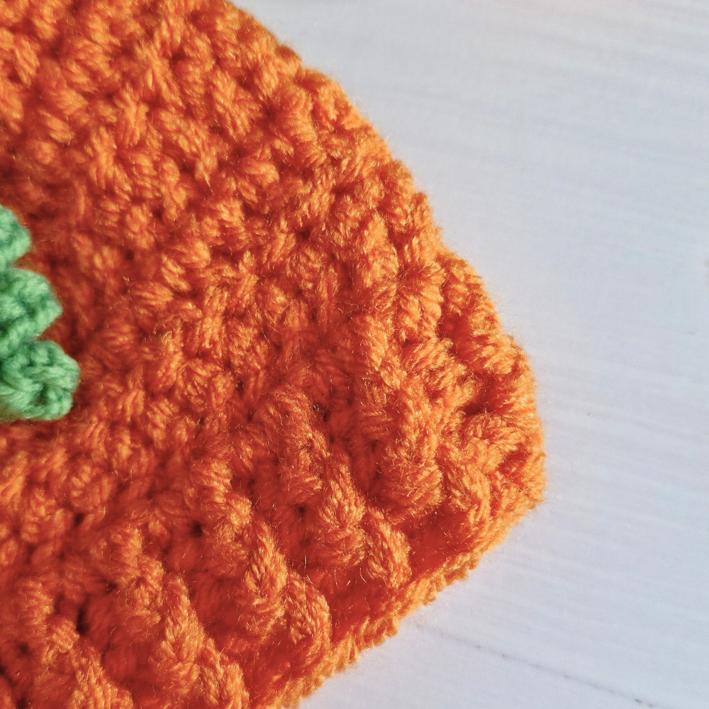 Handmade Handmade Crochet Pumpkin Baby Hat – Autumn Baby Gift – Beanie Hat crafted in soft acrylic yarn and available in multiple colours by Twisted by the Sea.