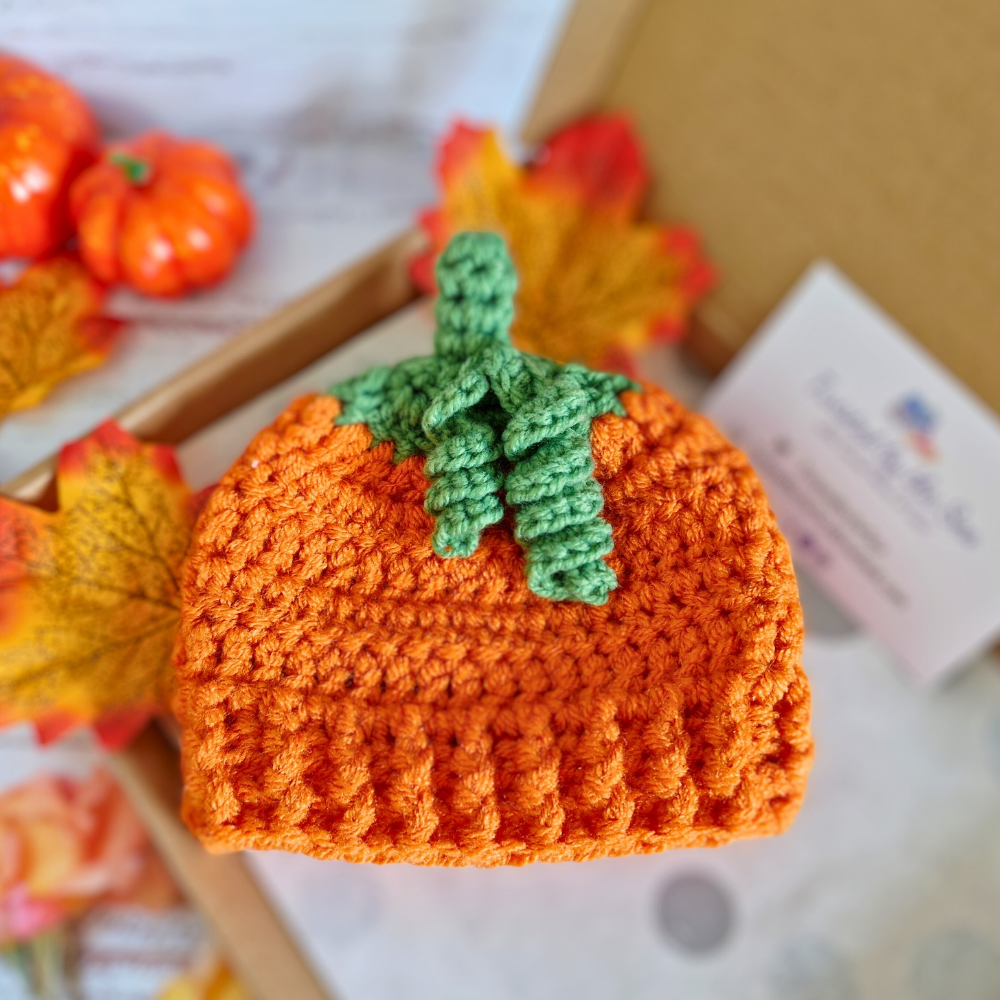 Handmade Handmade Crochet Pumpkin Baby Hat – Autumn Baby Gift – Beanie Hat crafted in soft acrylic yarn and available in multiple colours by Twisted by the Sea.